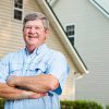 Senior man (60s) standing in back yard. Senior man (60s) standing in back yard.